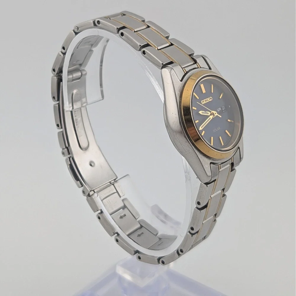 Seiko Solar V138-0AA0 Blue Sunburst Day/Date Two Tone Women's 25mm Watch